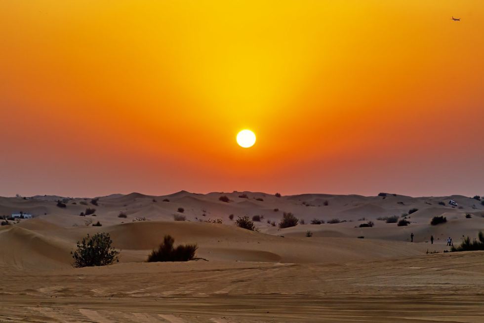 Sahara sunrise over sand dunes on Marrakech to Fes desert trip