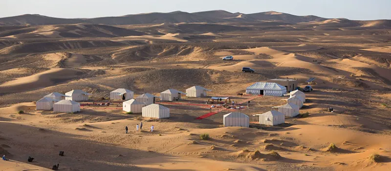6 Days Morocco Tour from Marrakech to the Sahara Desert. Camel trek, luxury camp, Atlas Mountains & Fes. Private 6 days desert tour.